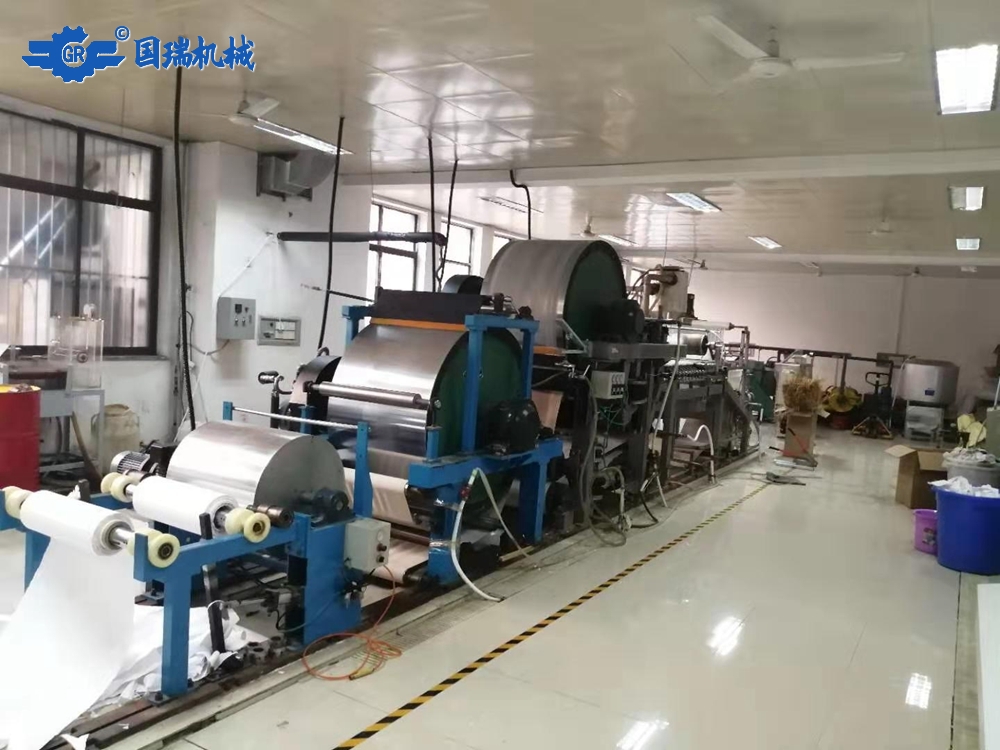 Friction sheet paper machine